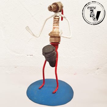 Recycled Spark Plug Drummer