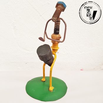 Recycled Spark Plug Drummer