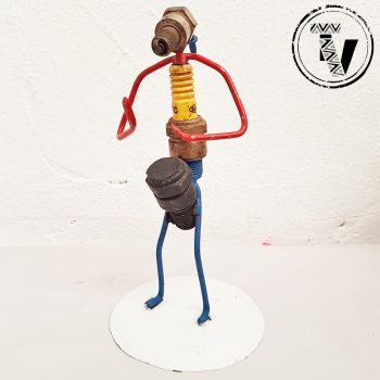 Recycled Spark Plug Drummer