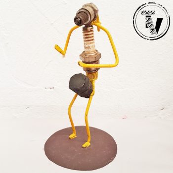 Recycled Spark Plug Drummer